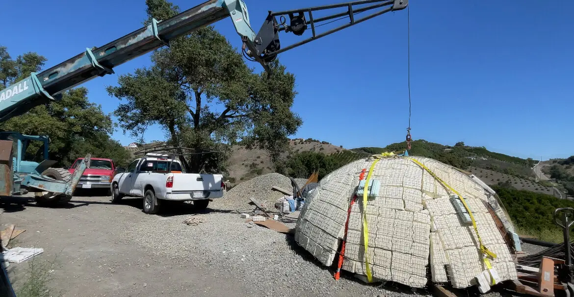 A crane is being used to lift a large octopus.