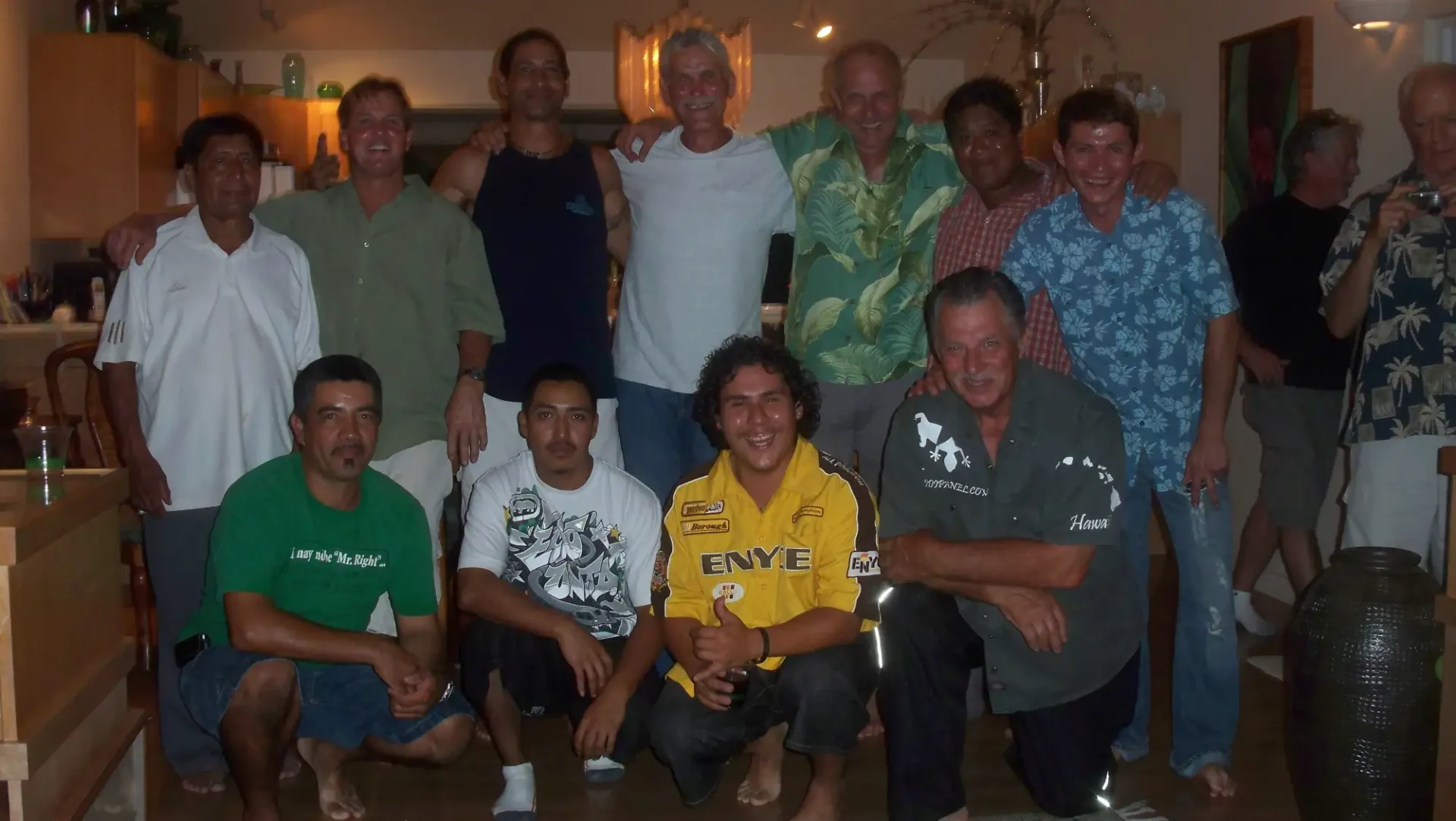 Group of men smiling together in Hawaii.