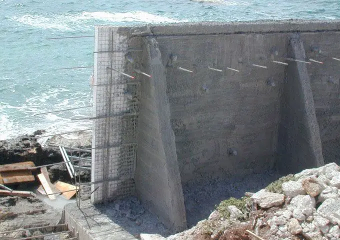 Concrete seawall construction with rebar.