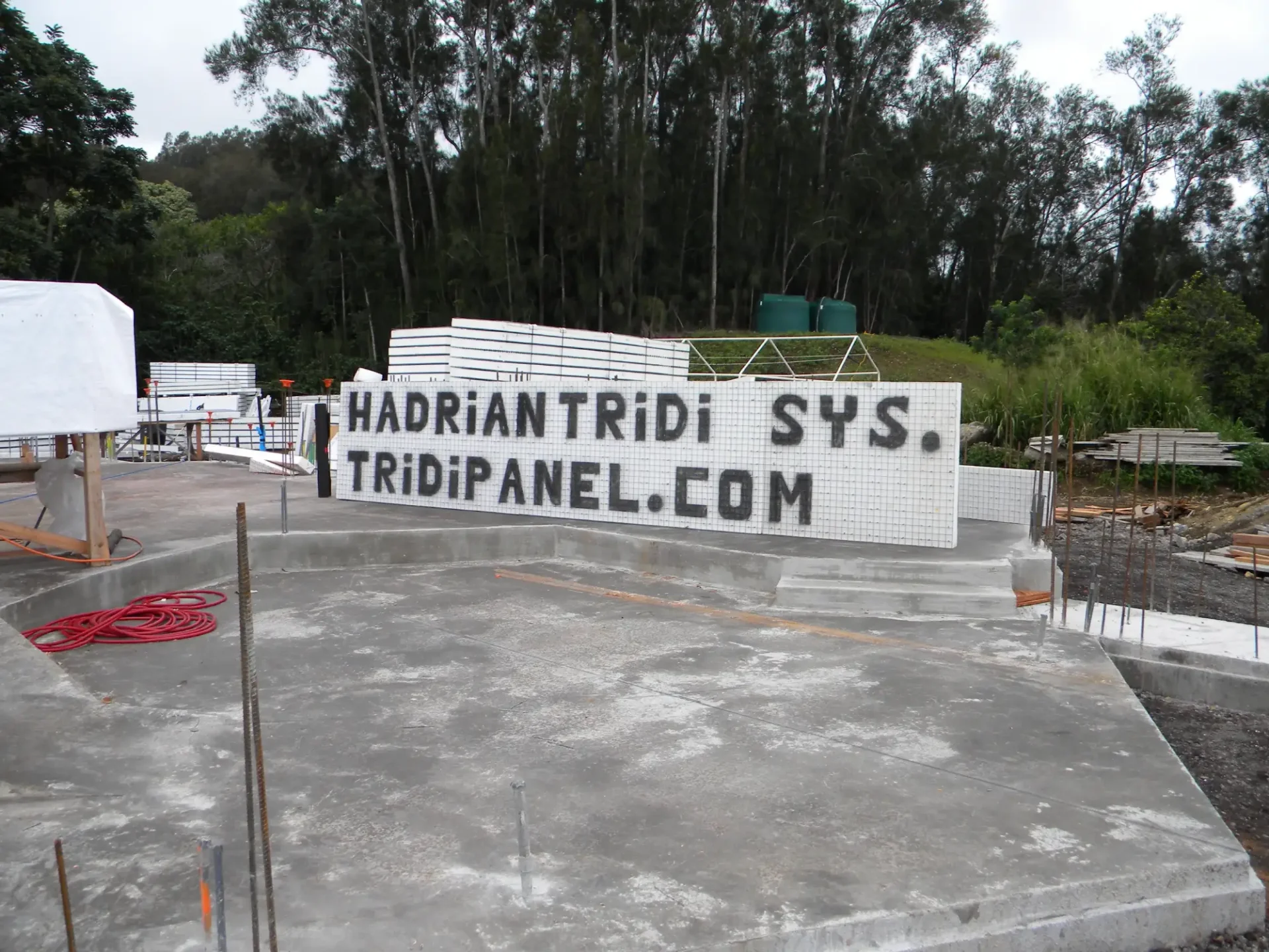 Concrete slab with company sign.